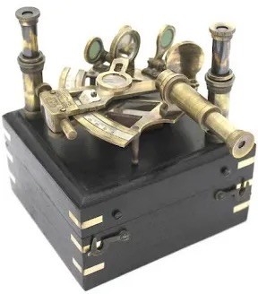 An antique brass sextant used for celestial navigation